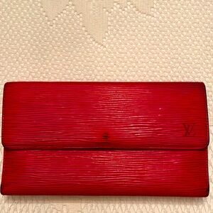 $1000 LV RED EPI TRIFOLD WALLET